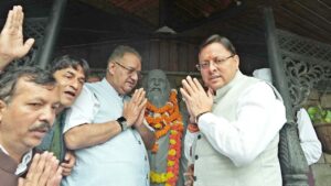 Pushskar Singh Dhami and Ganesh Joshi